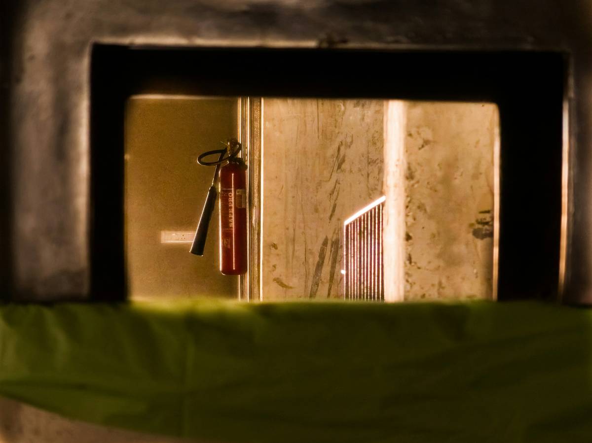 Professional team performing asbestos abatement services with full containment and HEPA filtration